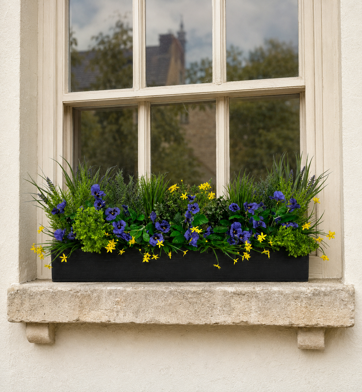 Artificial Spring Floral Window Box on a Stone Window Sill
