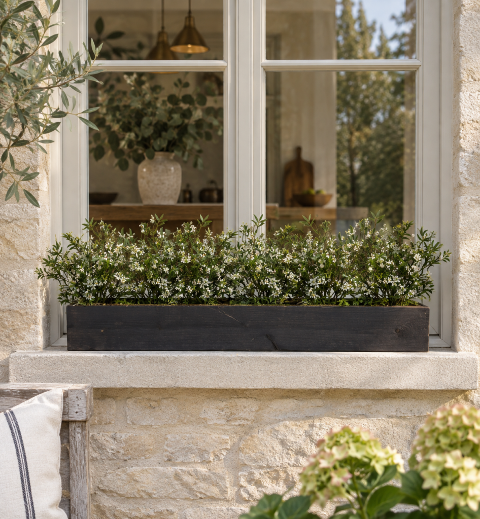 Artificial UV Flowering Olive Window Box displayed on an exterior kitchen window ledge