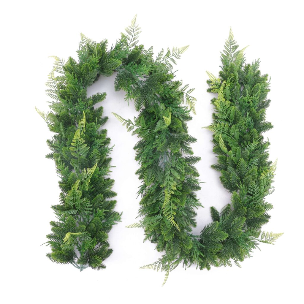 Artificial evergreen fern garland with dense green foliage